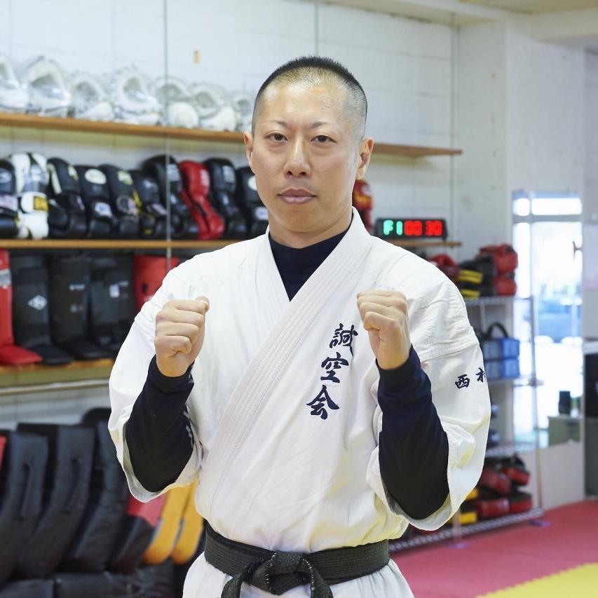 西村 正男